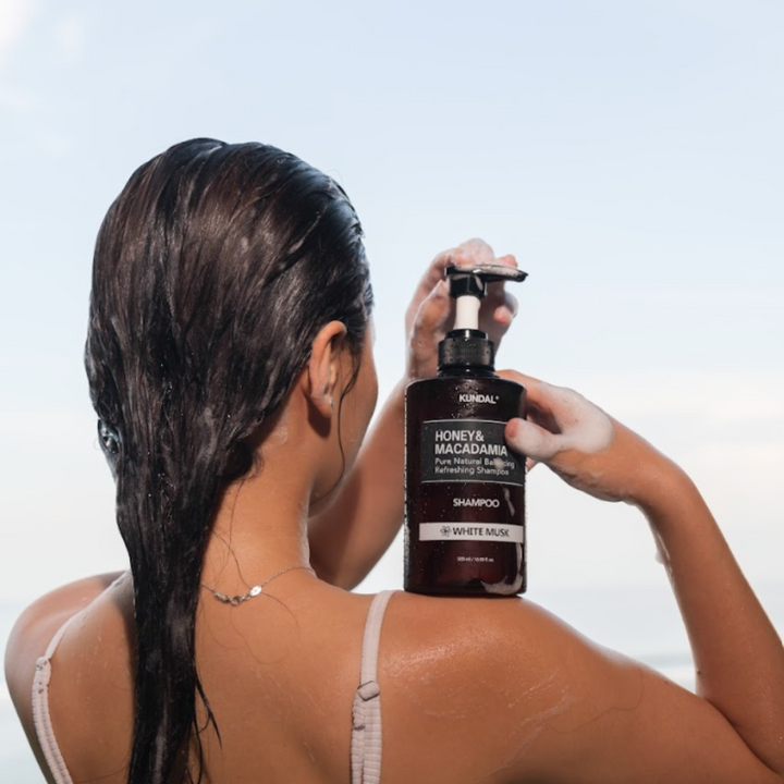 KUNDAL Honey & Macadamia Nature Shampoo White Musk (500ml) on wet hair